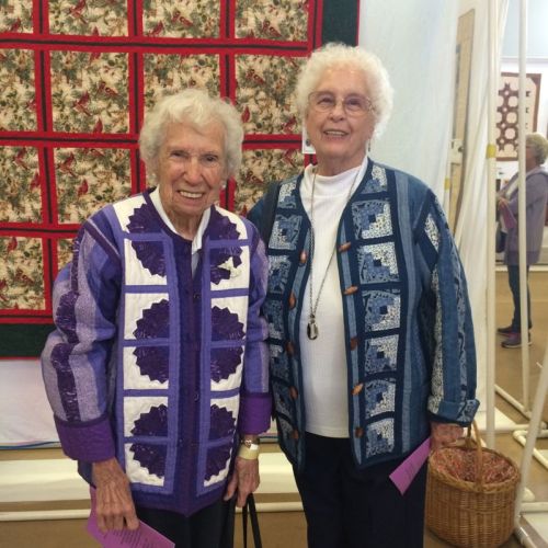 Twin Ladies in Quilted Jackets