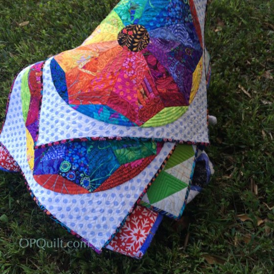 Stack of colorful quilts