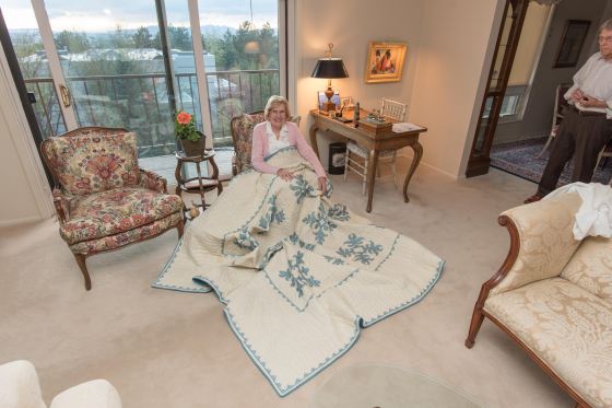 Mom and her quilt