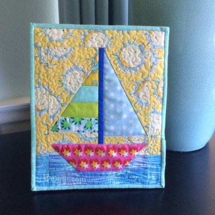 tiny-sailboat-quilt_front-on-frame