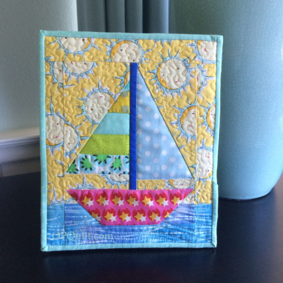 tiny-sailboat-quilt_front-on-frame